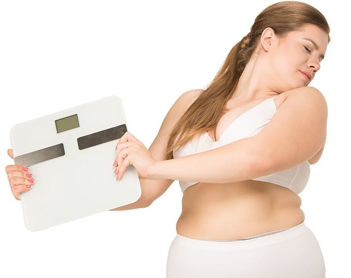 Menina gorda antes de tomar cápsulas de dieta ceto